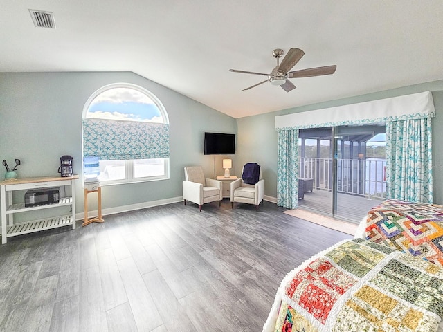 bedroom with hardwood / wood-style flooring, ceiling fan, access to outside, and vaulted ceiling