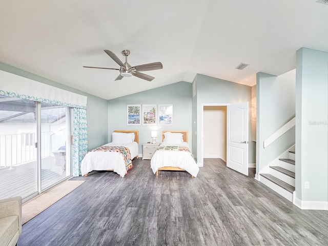 bedroom featuring dark hardwood / wood-style flooring, access to outside, ceiling fan, and lofted ceiling