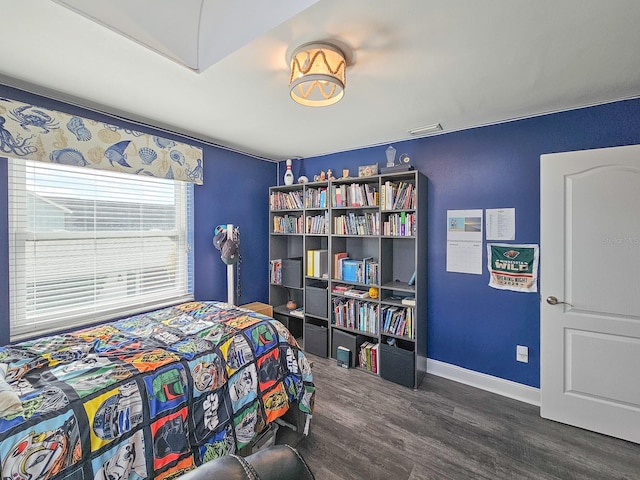 bedroom featuring wood-type flooring