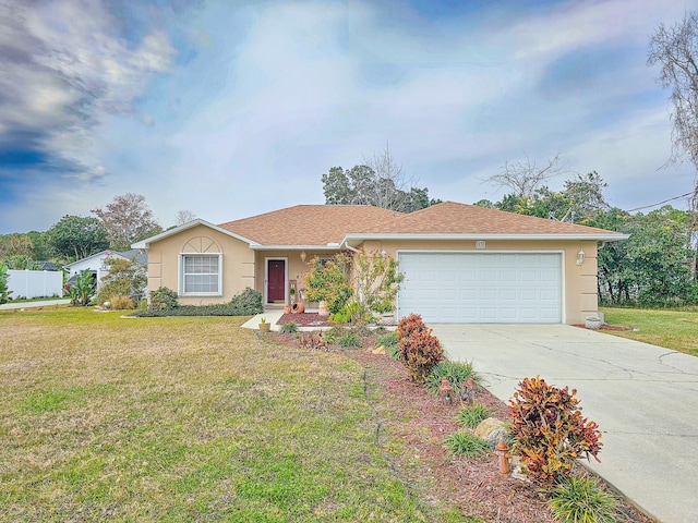 ranch-style house featuring a front lawn and a garage