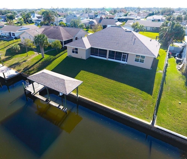 bird's eye view with a water view