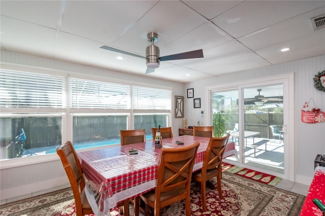 dining room featuring a paneled ceiling and ceiling fan