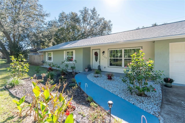 single story home with a garage