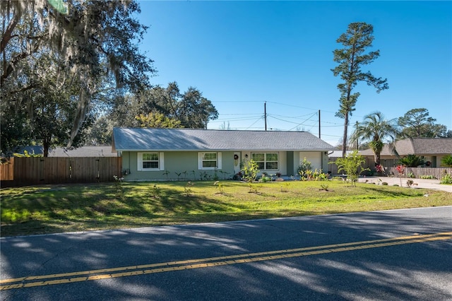 ranch-style house with a front yard