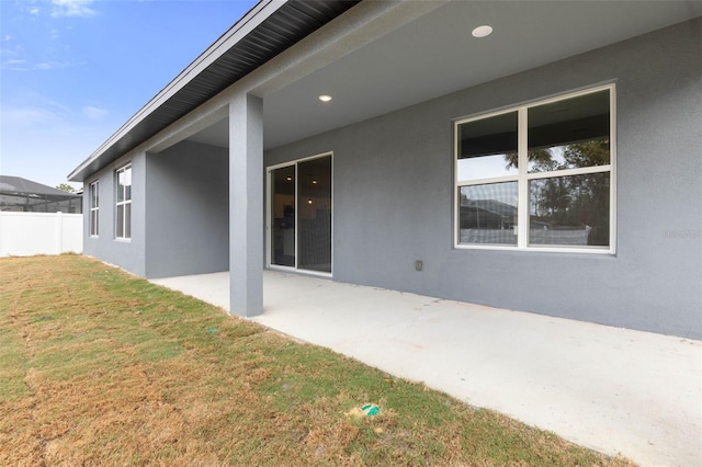 exterior space with a yard and a patio