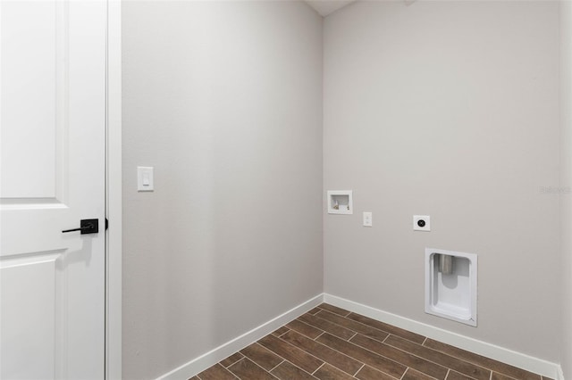 75 Randolph Dr, Palm Coast, FL 32164 - laundry area with baseboards, wood finish floors, washer hookup, laundry area, and electric dryer hookup