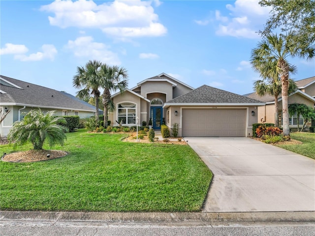 view of front facade featuring a garage and a front lawn