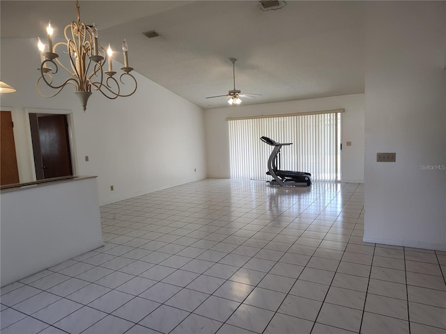 unfurnished living room featuring lofted ceiling, light tile patterned floors, and ceiling fan with notable chandelier