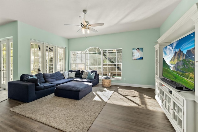 living room featuring ceiling fan, french doors, and hardwood / wood-style flooring