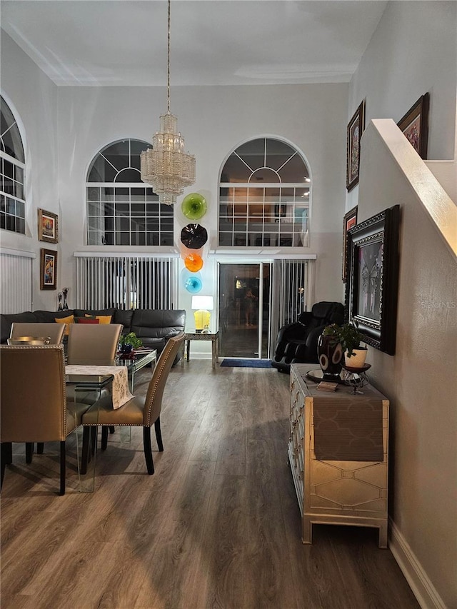 dining area featuring a chandelier and hardwood / wood-style flooring