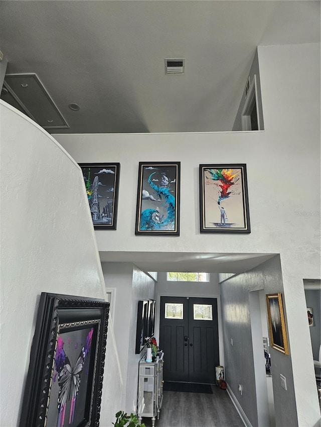 entrance foyer featuring hardwood / wood-style floors