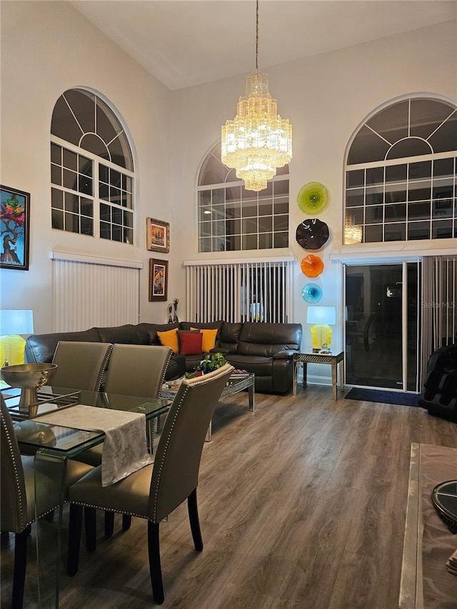 dining space featuring a chandelier and hardwood / wood-style flooring