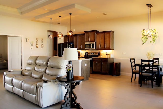 living area featuring a notable chandelier