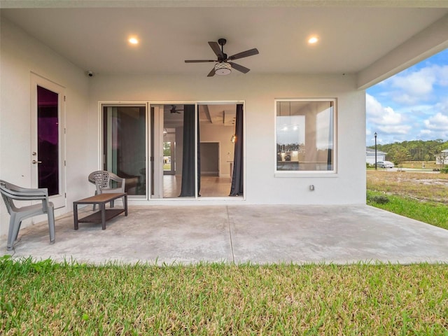 view of patio with ceiling fan