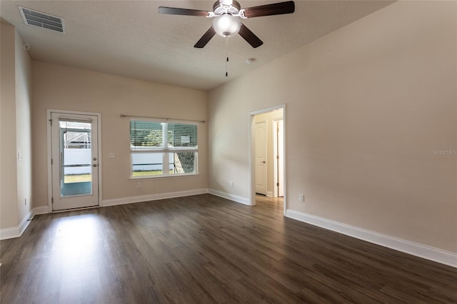 empty room featuring dark hardwood / wood-style floors and ceiling fan