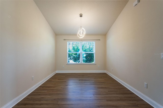 unfurnished dining area with dark hardwood / wood-style floors