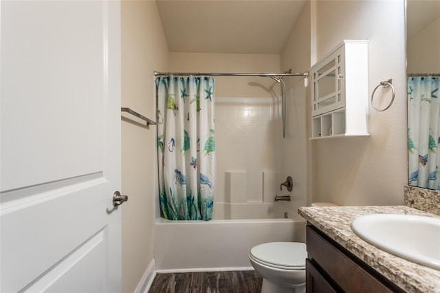 full bathroom featuring hardwood / wood-style flooring, vanity, shower / bathtub combination with curtain, and toilet