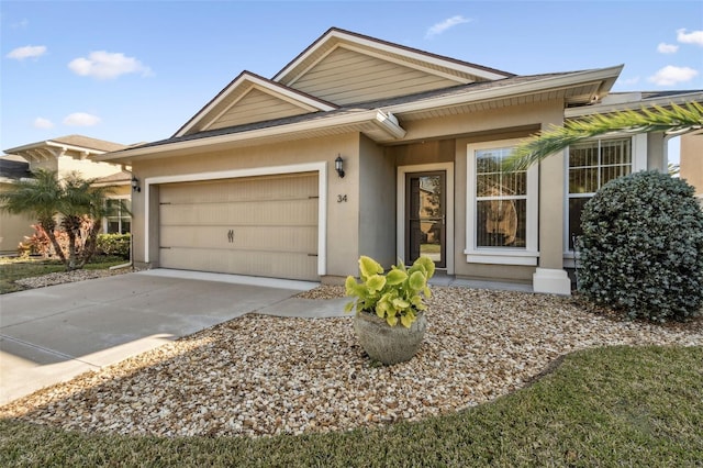 ranch-style house featuring a garage