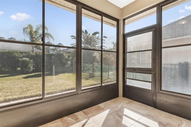 unfurnished sunroom with a healthy amount of sunlight