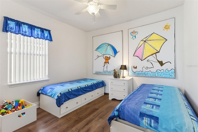 bedroom featuring ceiling fan and dark hardwood / wood-style floors