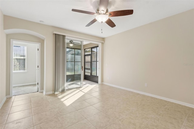 spare room featuring light tile patterned floors