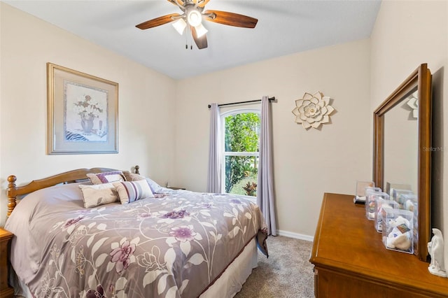 bedroom with light colored carpet and ceiling fan