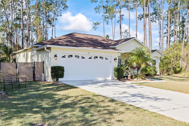 ranch-style house with a garage and a front yard