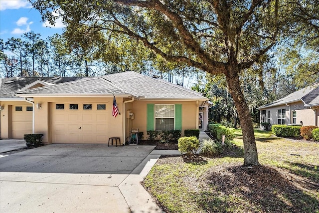 single story home with a front lawn and a garage