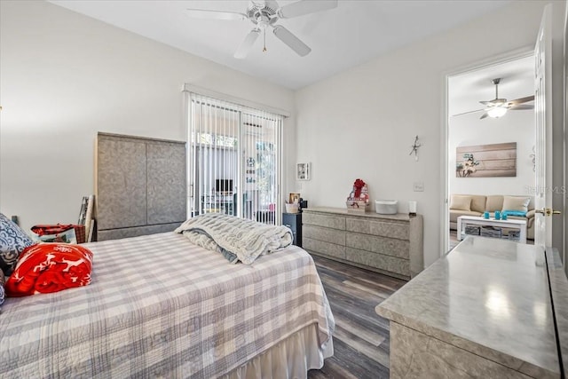 bedroom featuring ceiling fan and dark hardwood / wood-style flooring