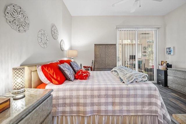 bedroom featuring access to exterior, ceiling fan, and dark hardwood / wood-style floors