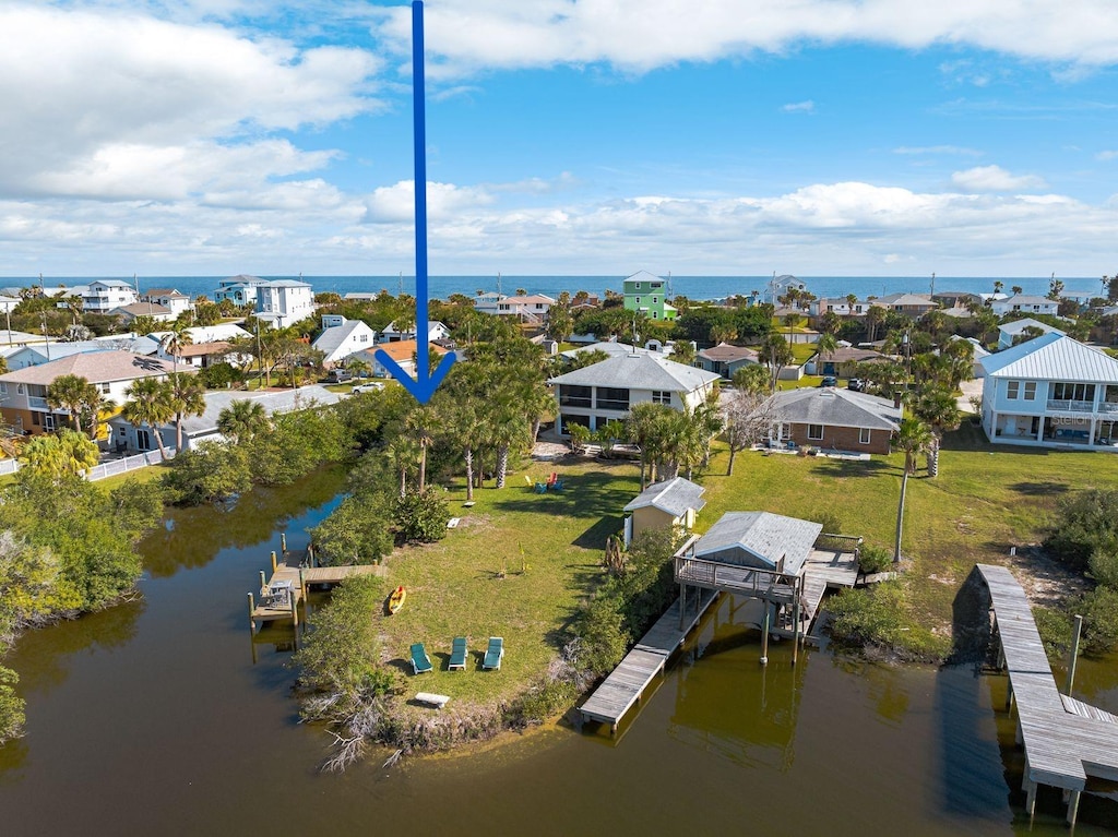 drone / aerial view featuring a water view