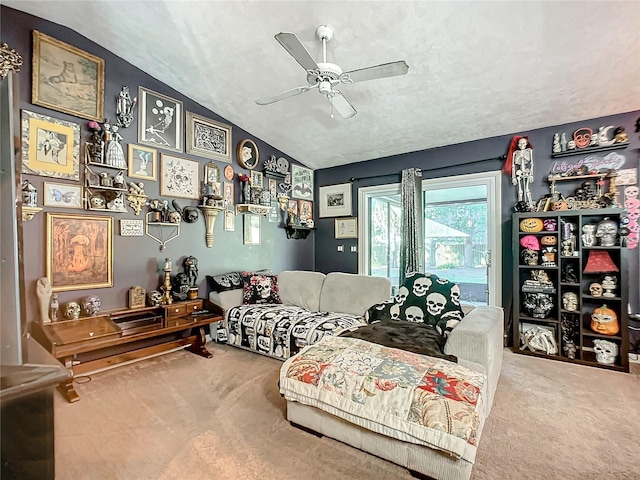 carpeted living room featuring a textured ceiling, ceiling fan, and vaulted ceiling