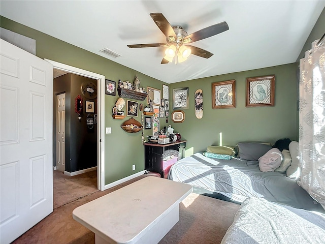 carpeted bedroom featuring ceiling fan