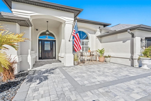 doorway to property with covered porch