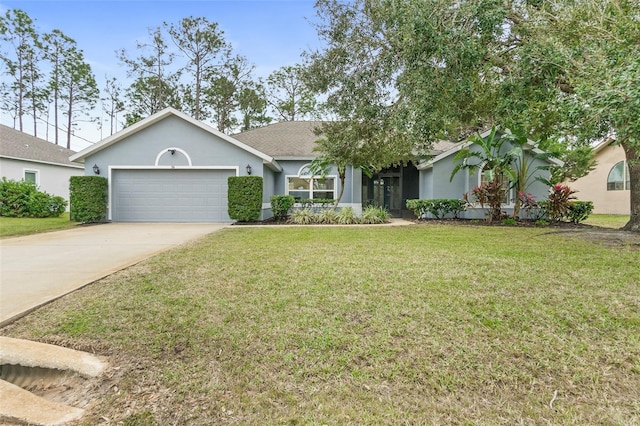 single story home with a front yard and a garage