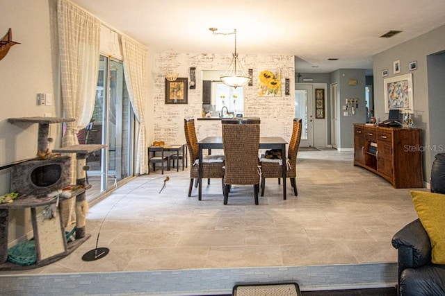 dining room featuring sink