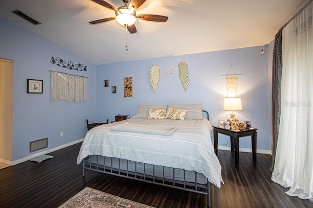 bedroom featuring ceiling fan, wood-type flooring, and lofted ceiling