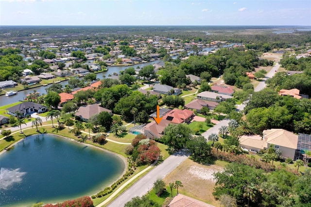 bird's eye view with a water view and a residential view