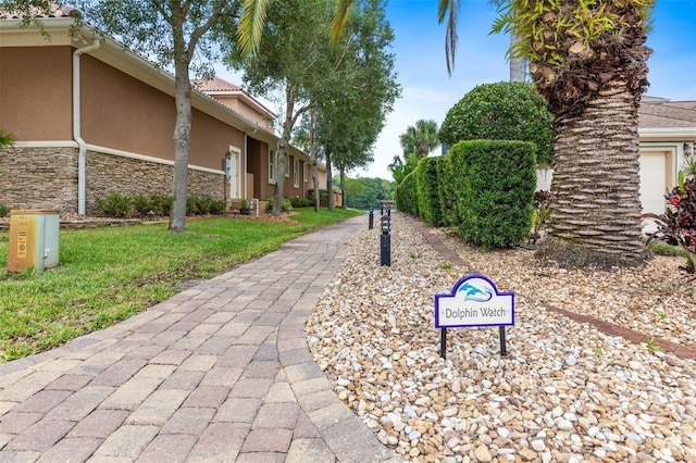 view of community with a lawn