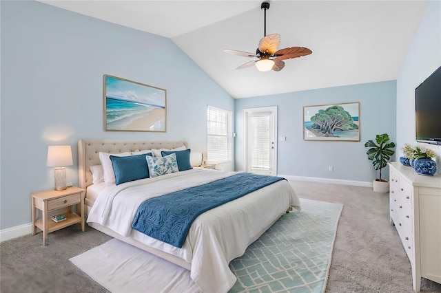 bedroom with a ceiling fan, light colored carpet, vaulted ceiling, and baseboards