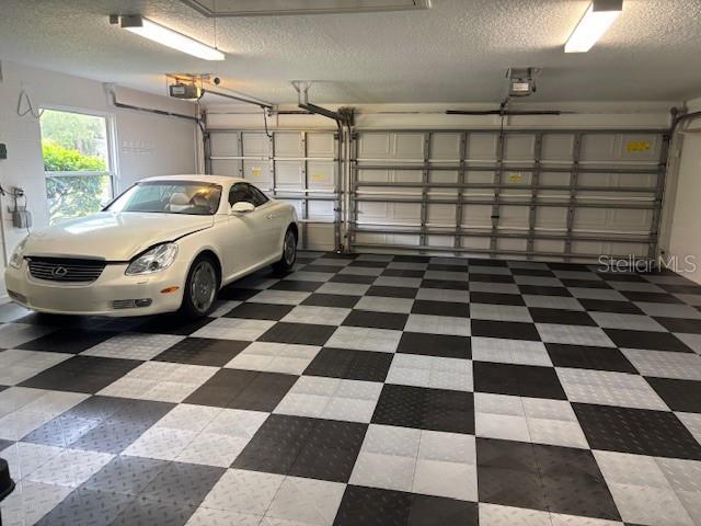 garage with a garage door opener