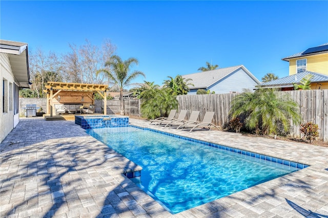 view of pool featuring a pergola, an in ground hot tub, and a patio