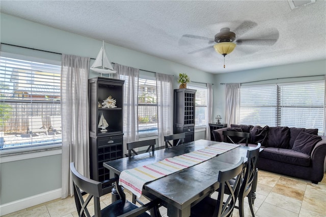 dining room with ceiling fan