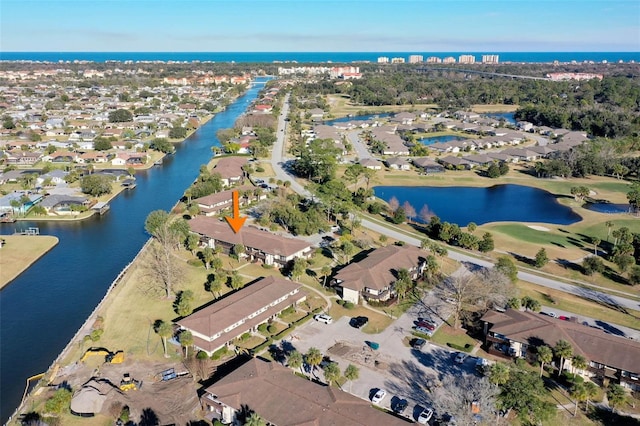 drone / aerial view featuring a water view