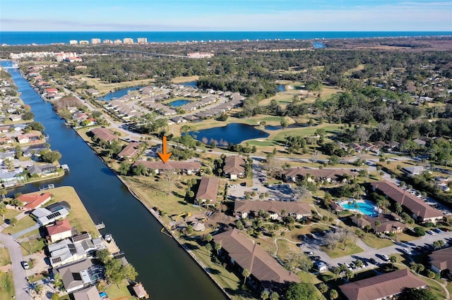 bird's eye view with a water view