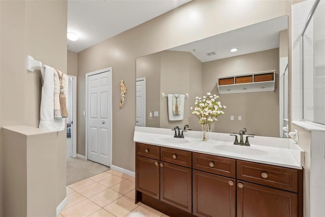 bathroom featuring tile patterned floors and vanity