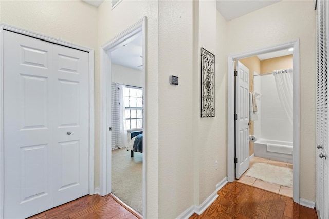 hall featuring hardwood / wood-style floors