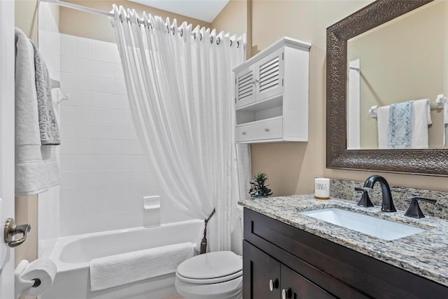 full bathroom featuring vanity, shower / bath combination with curtain, and toilet