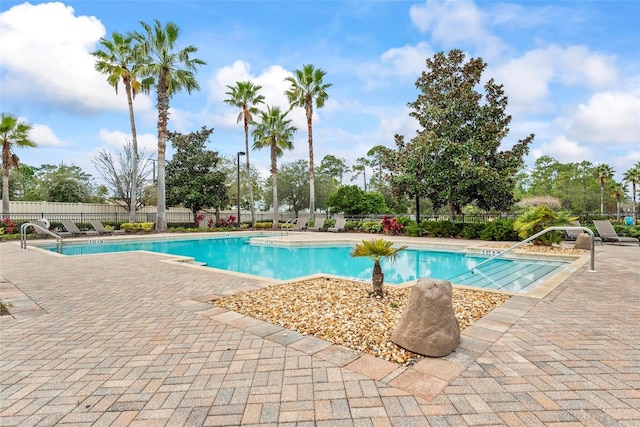 view of swimming pool with a patio