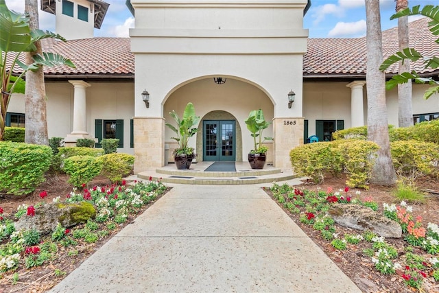 doorway to property featuring french doors